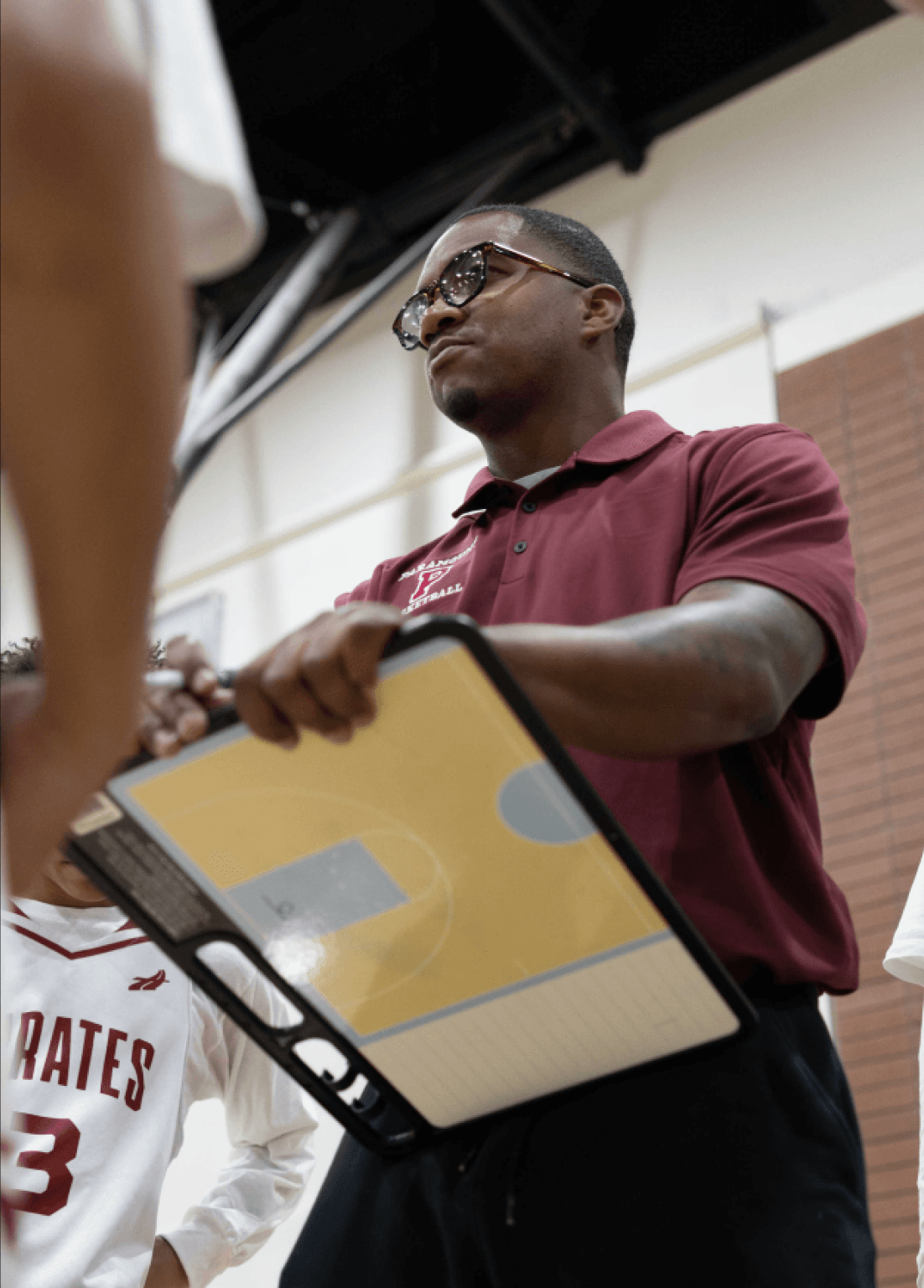 Basketball coach with players