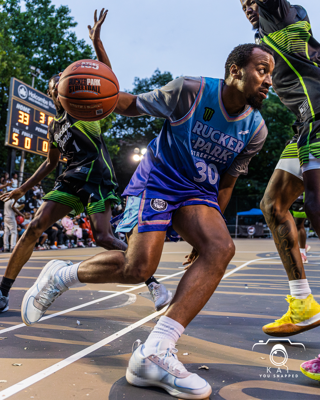Rucker Park player hitting basketball